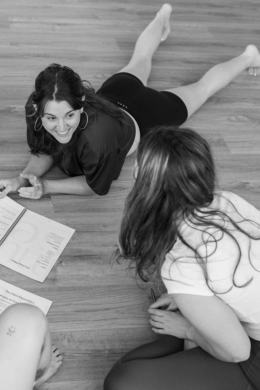 Emma-Kate mentoring Pilates teachers during a MUSE training session, guiding with personalised support and teaching resources in Australia.